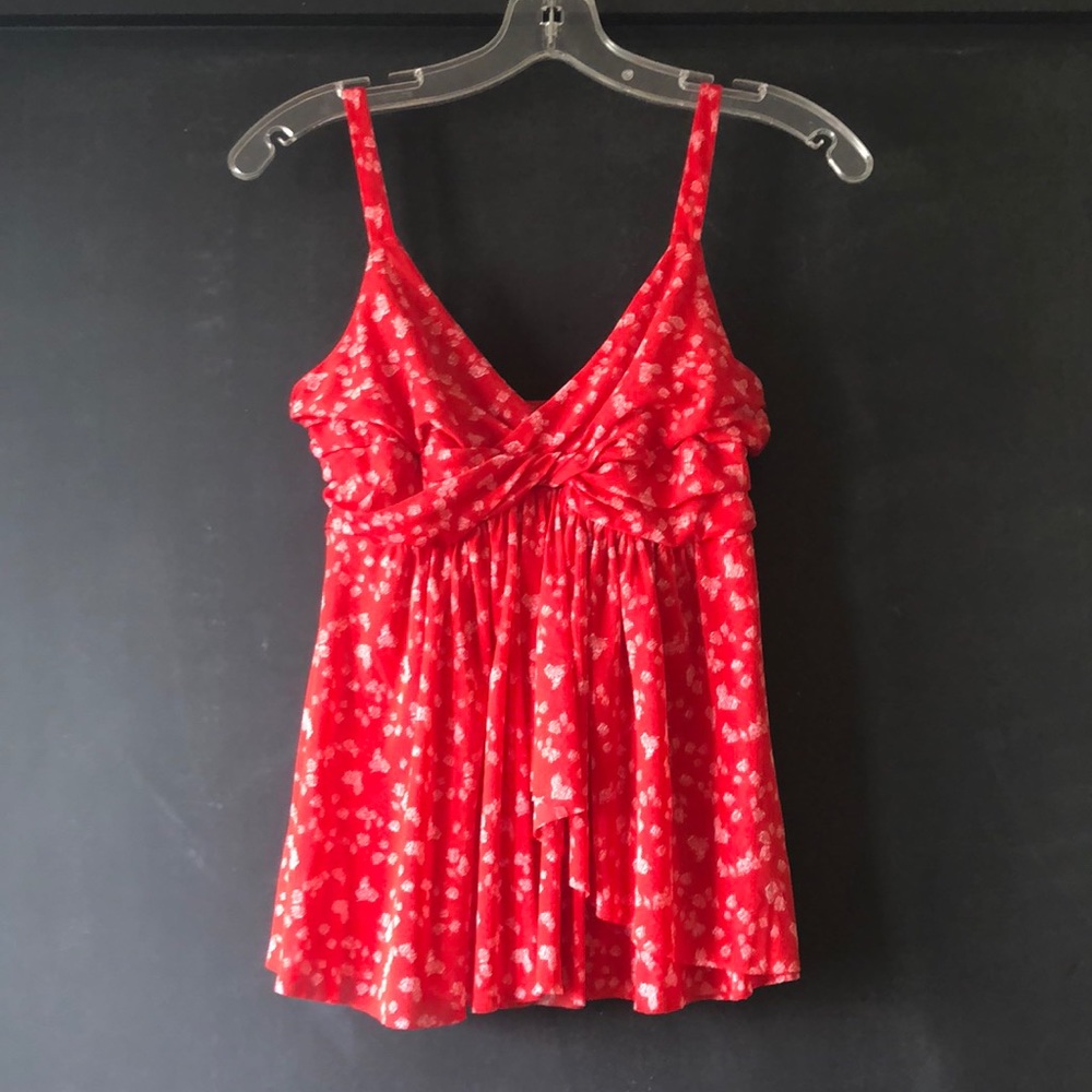 Red sleeveless blouse